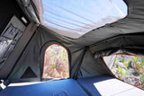 Alu Cab Family RT-4S Innenraumansicht mit Aussicht durch verschiedene Fenster